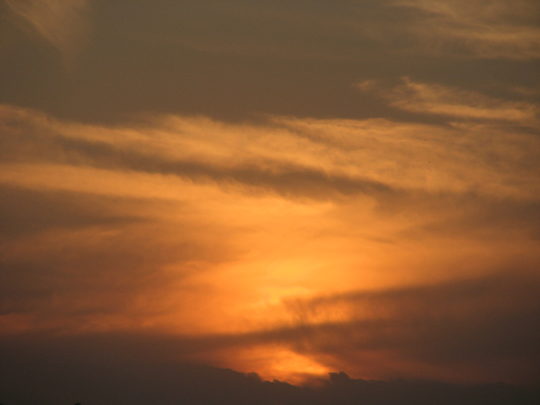 Sunset, prairie center lake